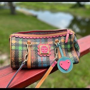 Dooney and Bourke original bag. Has one small detail (see last photo).